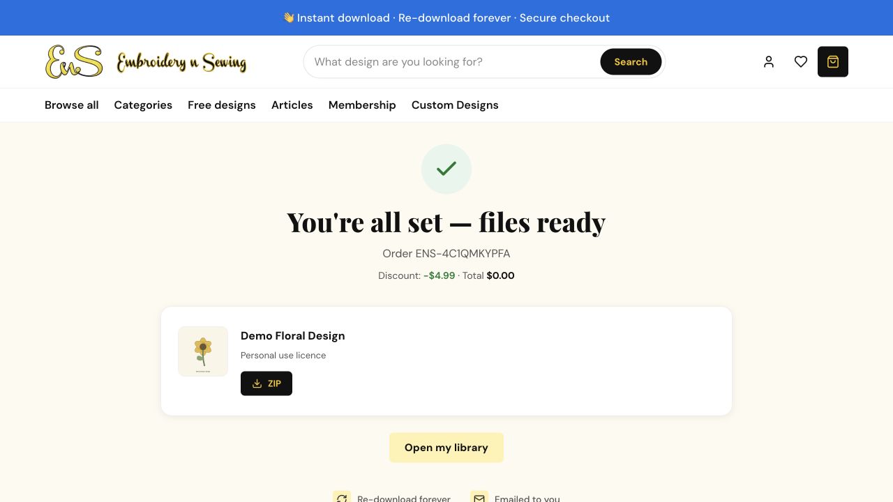 Example membership order confirmation showing the included design at $0.00 and its ZIP download